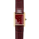 A Lady's vermeil cased wrist watch, Must De Cartier