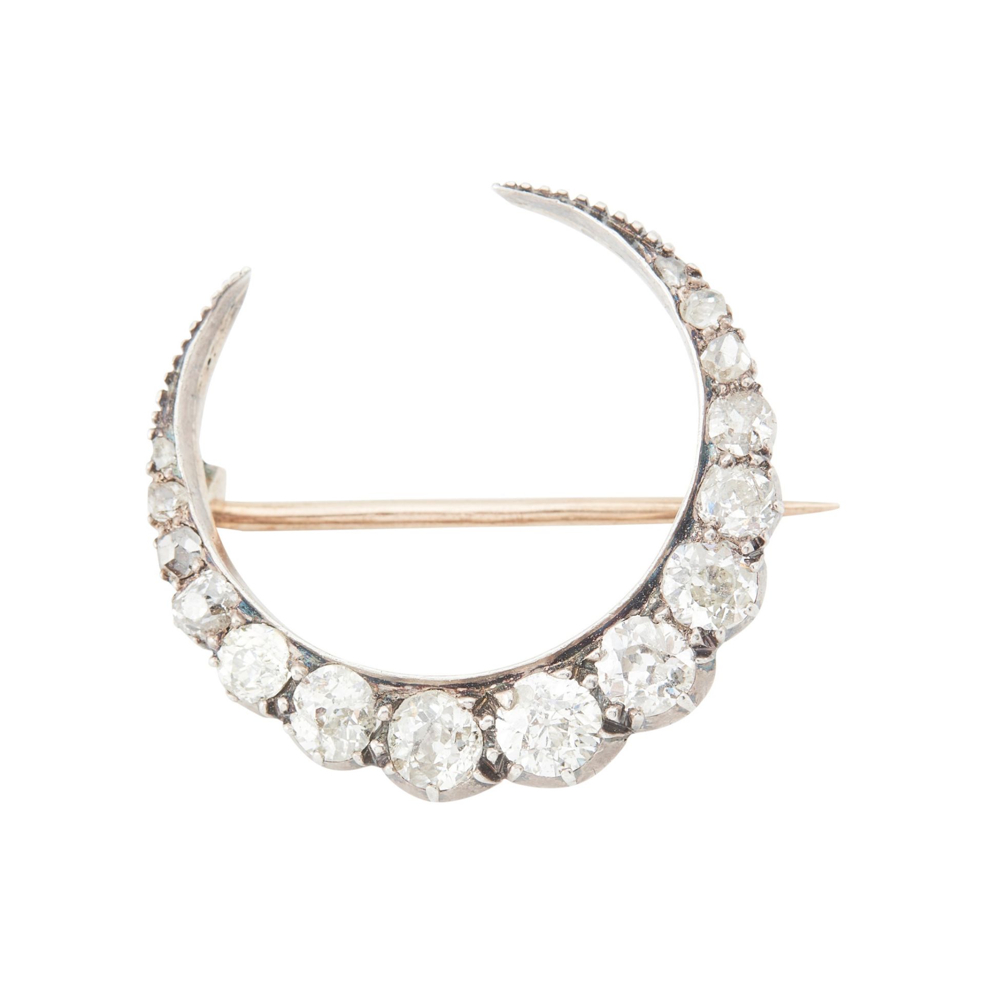 A Victorian diamond set crescent brooch