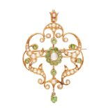 An early 20th century peridot and seed pearl set pendant