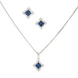 An 18ct white gold sapphire and diamond set pendant and earring set