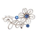 A sapphire and diamond set spray brooch