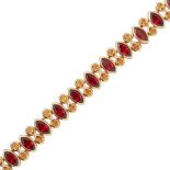 A garnet and citrine set bracelet