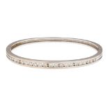 A 18ct white gold diamond set bangle