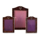 A set of three silver mounted and tortoiseshell photo frames