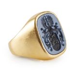 A large armorial sardonyx gold ring