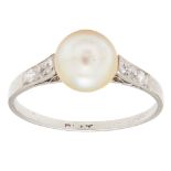 A natural pearl and diamond set ring