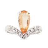 An Imperial topaz and diamond set ring