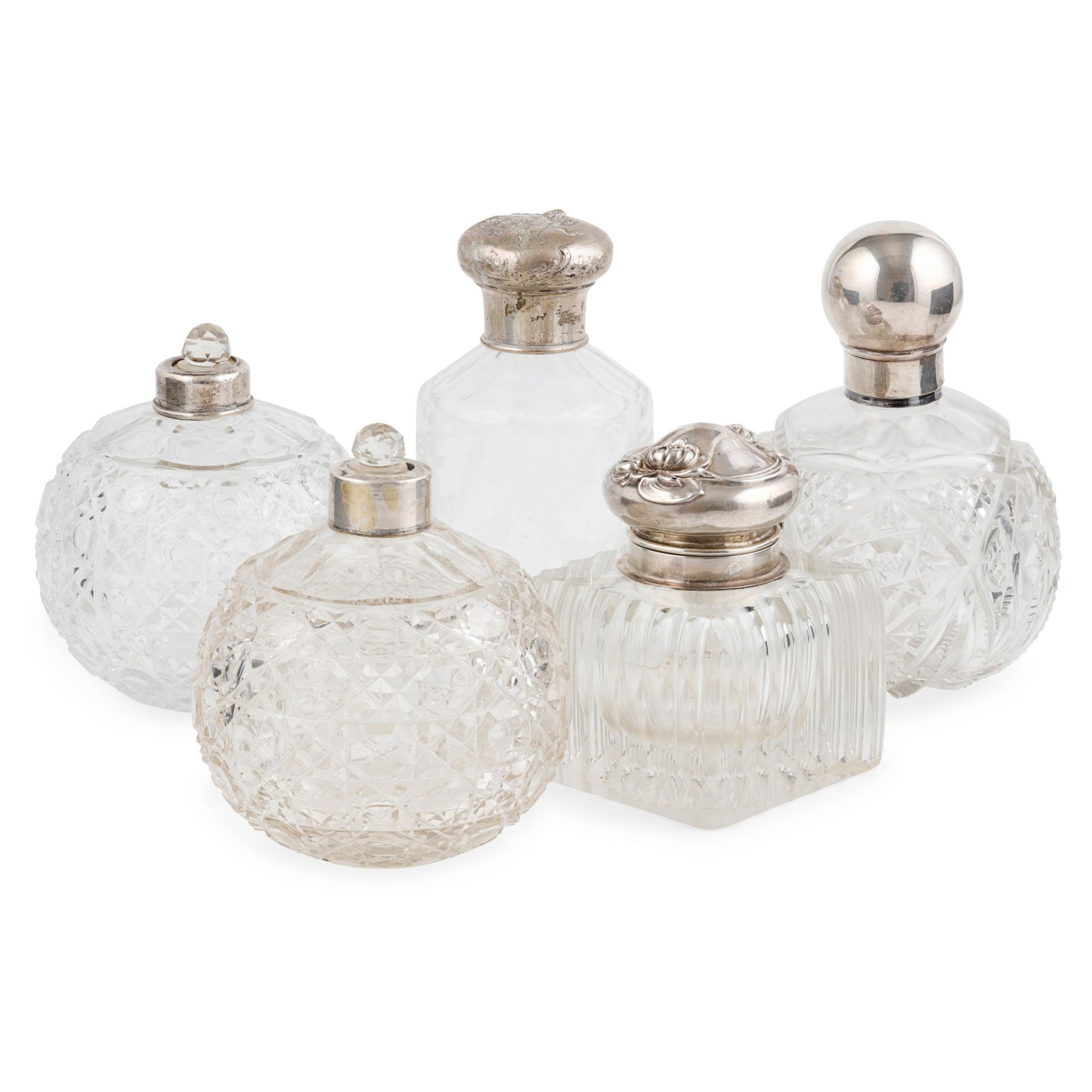 A collection of silver mounted glass dressing table bottles