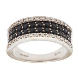A 18ct white gold black and colourless diamond set ring