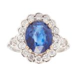 An 18ct sapphire and diamond set cluster ring