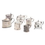 A collection of seven mustard pots