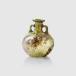 ROMAN GLASS BOTTLE ROMAN EMPIRE, C. 3RD CENTURY A.D.