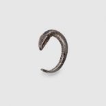 PUBLISHED VIKING SERPENT RING BRITISH ISLES, C. 6TH - 9TH CENTURY A.D.