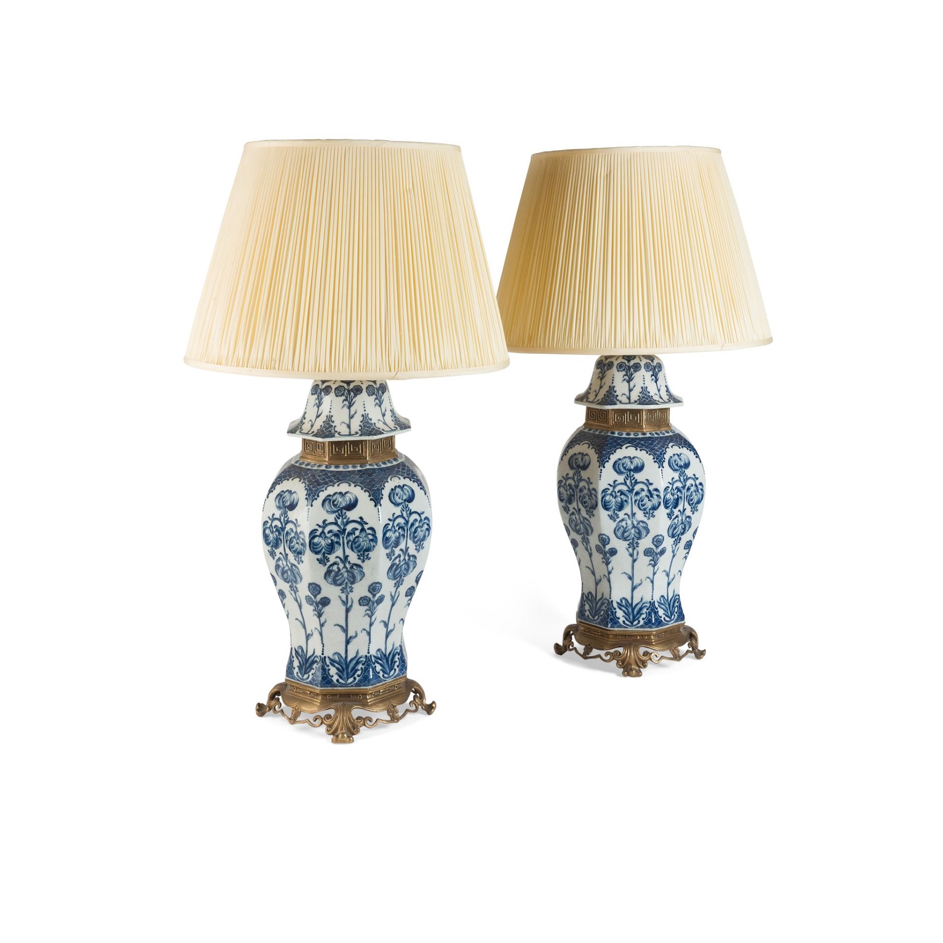 PAIR OF BLUE AND WHITE POTTERY AND GILT METAL MOUNTED BALUSTER LAMPS LATE 19TH/EARLY 20TH CENTURY
