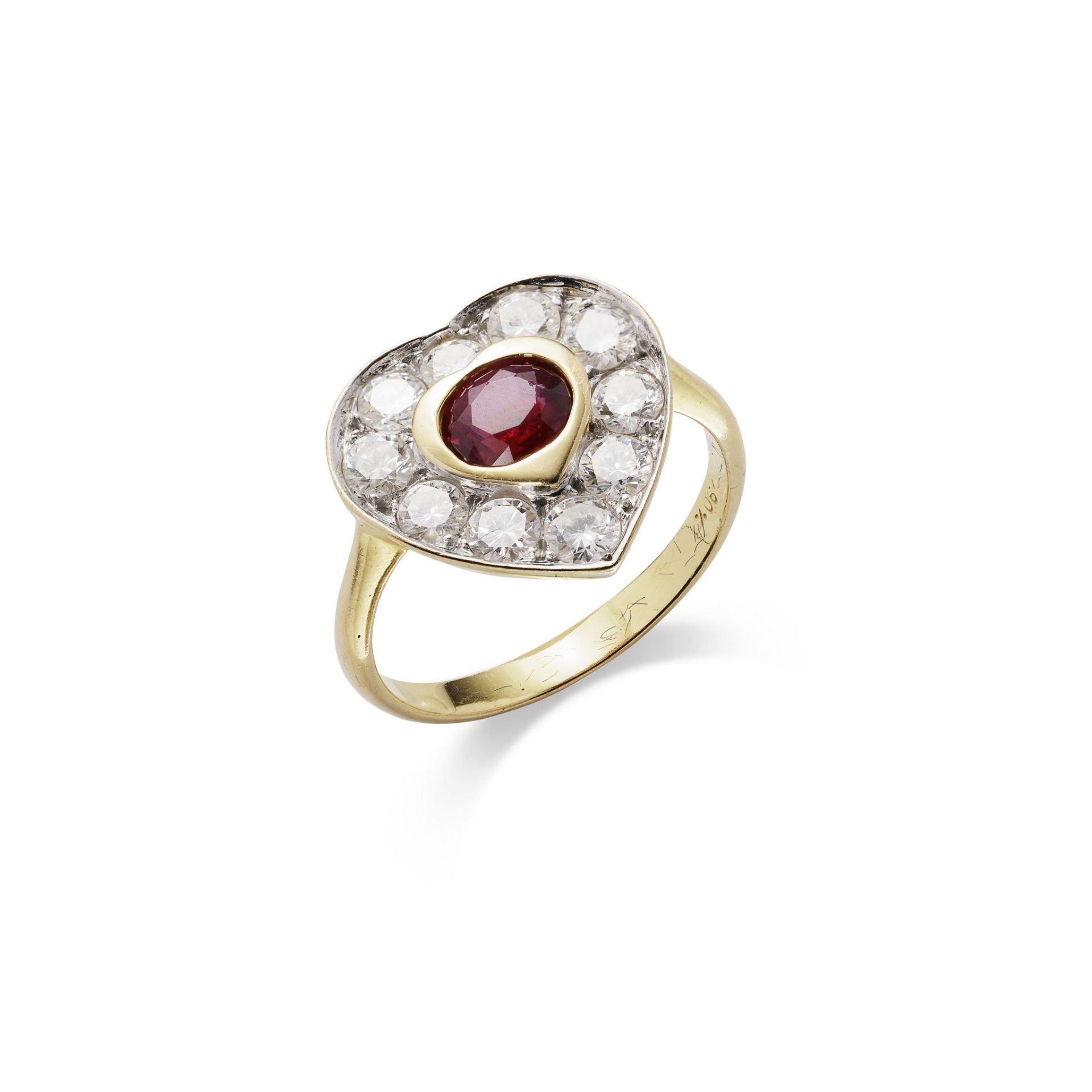 A RUBY AND DIAMOND CLUSTER RING