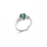 AN EMERALD AND DIAMOND RING