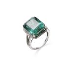 AN EMERALD AND DIAMOND RING