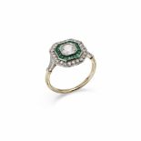 A DIAMOND AND EMERALD TARGET CLUSTER RING