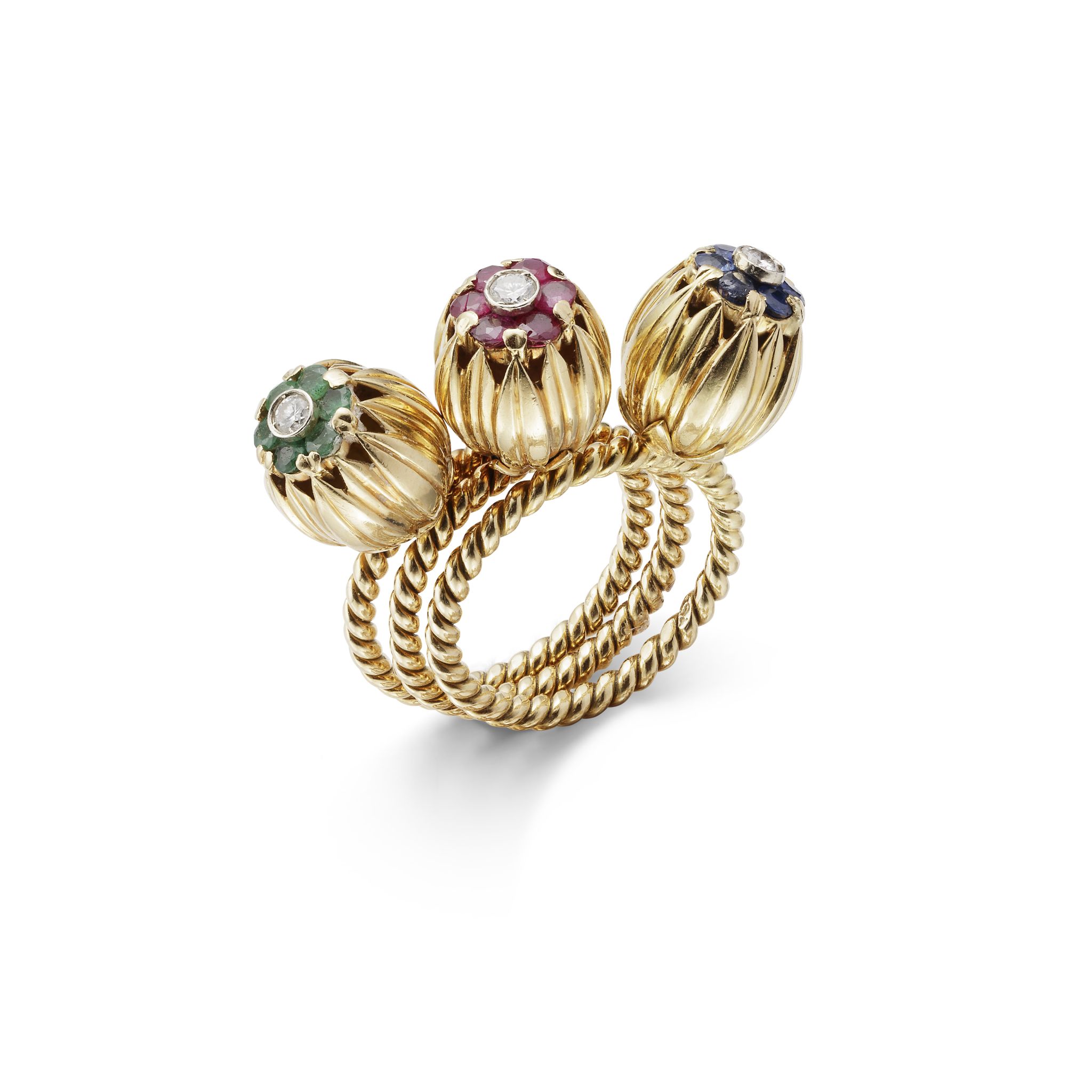 A SET OF THREE GEM-SET STACKING RINGS