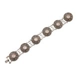 SCOTTISH SCHOOL CELTIC REVIVAL STYLE WHITE METAL & ROSE QUARTZ BRACELET, CIRCA 1910