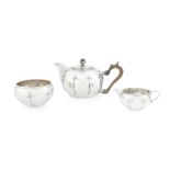 FRANCIS JOSEPH COMBE JORDAN, BIRMINGHAM ARTS & CRAFTS THREE-PIECE SILVER TEA SERVICE, BIRMINGHAM