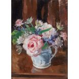 § DONALD MOODIE R.S.A.,P.S.S.A. (SCOTTISH 1892-1963) FLOWERPIECE