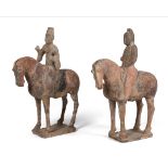 TWO POTTERY FIGURES OF EQUESTRIANS TANG DYNASTY