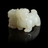WHITE JADE CARVING OF TWO LUDUANS QING DYNASTY, 18TH CENTURY