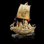Y BONE AND IVORY OKIMONO OF A BOAT WITH DEITIES 20TH CENTURY