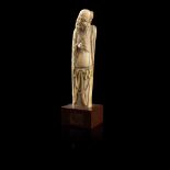 Y CARVED IVORY MALE FIGURE QING DYNASTY, 18TH CENTURY
