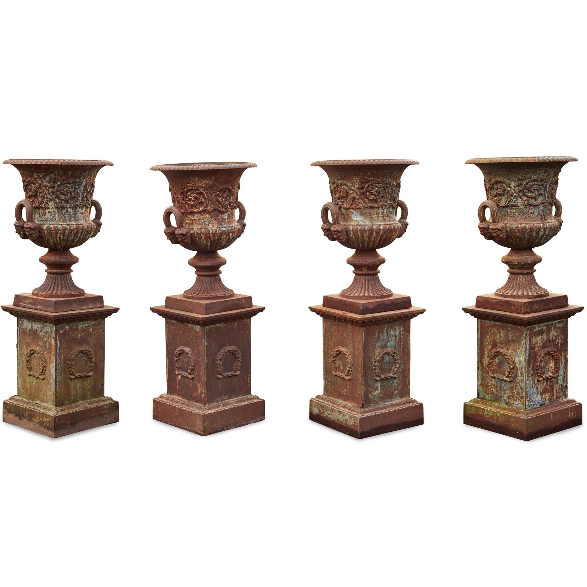 SET OF FOUR CAST IRON GARDEN URNS AND PLINTHS 20TH CENTURY