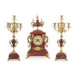 FRENCH ROUGE MARBLE AND GILT METAL CLOCK GARNITURE EARLY 20TH CENTURY