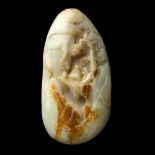 CARVED PALE CELADON AND RUSSET JADE BOULDER