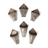 GROUP OF SIX STRAIGHT CHINESE OR SOUTHEAST ASIAN BETEL LEAF HOLDERS 20TH CENTURY