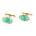 A pair of jade set cufflinks