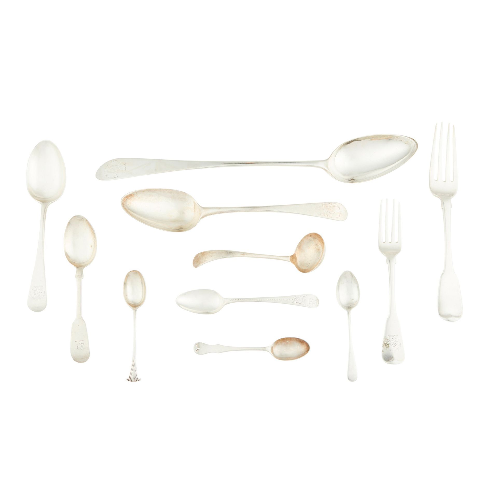 An assembled suite of flatware