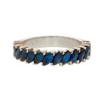 A sapphire set half eternity ring