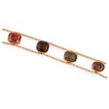 A tourmaline and zircon set bracelet