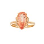 An imperial topaz and diamond set ring