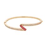 A Continental ruby and diamond set bangle