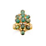A green sapphire and diamond set cluster ring