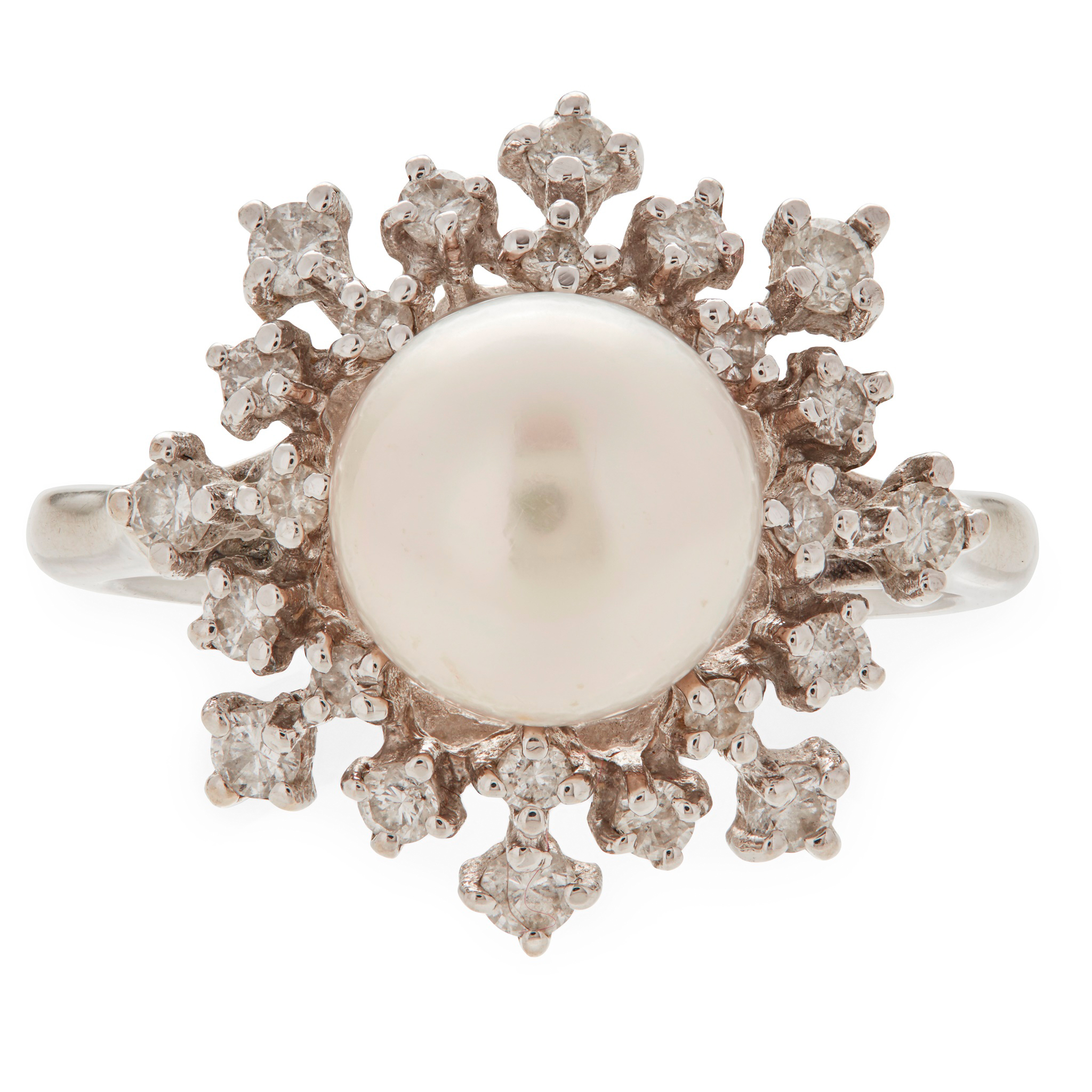 A pearl and diamond set cluster ring