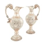 A pair of Spanish wine ewers