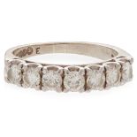 A diamond set half eternity ring