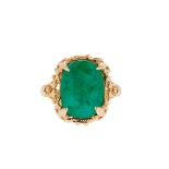 An emerald set ring