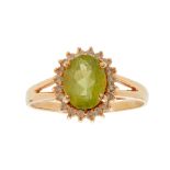 A peridot and diamond set cluster ring