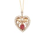 A late 19th century ruby and diamond set pendant/brooch
