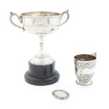 A collection of golfing memorabilia, related to the Howman family