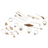 A collection of tie pins and brooches