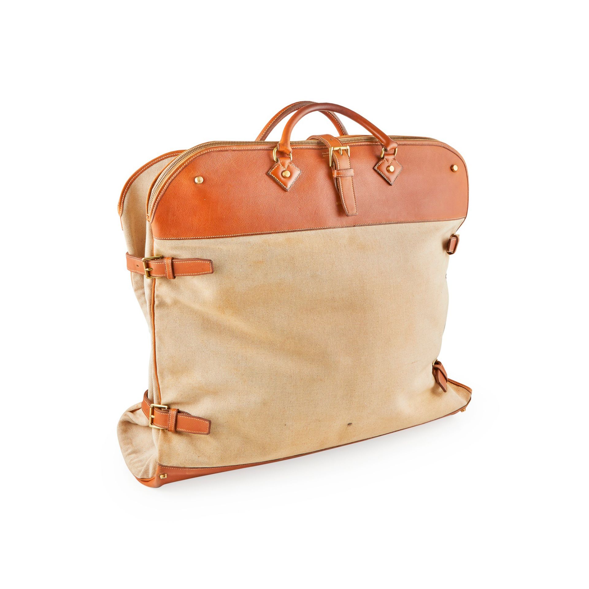 A leather and canvas 'Atlas' suit carrier, Hermès